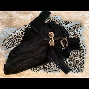 Chico’s ribbed, black turtleneck sweater. Size 2 (12-14 L). Like new.